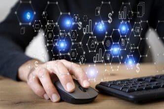 A laptop sits in front of a background displaying a data visualization of a computer's inner workings.