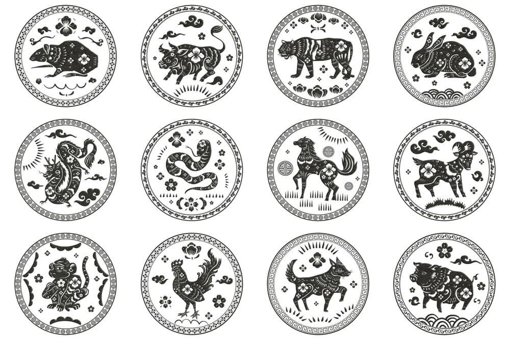 Set of black, circular stickers featuring the symbols of the Chinese zodiac animals.