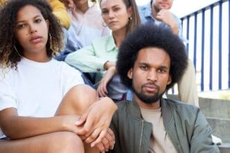 Close-up portrait of several young people of mixed race.