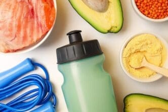 Top-down view of sports nutrition concept, possibly depicting various supplements and healthy food items.
