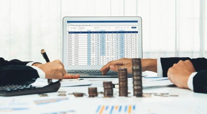 A stack of coins represents business investment, with a shrewd, calculating accountant in the background.