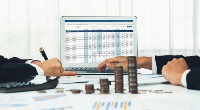 A stack of coins represents business investment, with a shrewd, calculating accountant in the background.
