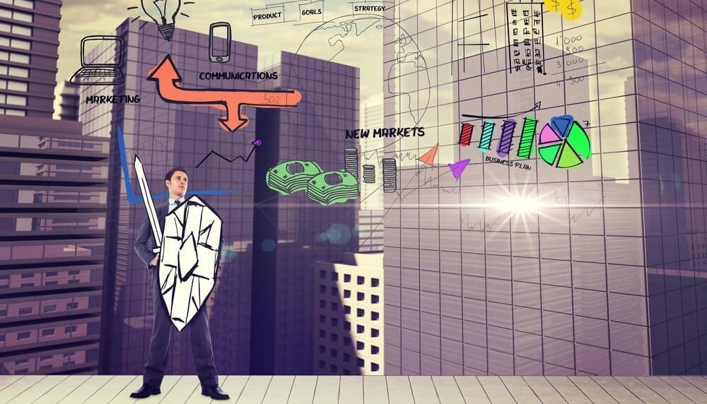 A businessperson in a suit stands with arms crossed, superimposed over a cityscape graphic.