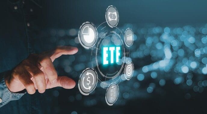 A hand touches a virtual reality screen displaying icons representing an ETF (Exchange Traded Fund), symbolizing stock market trading and financial investment.