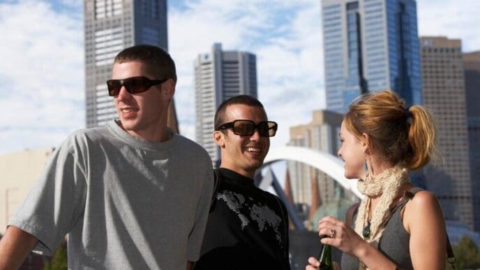 A family smiles and poses together during their vacation.