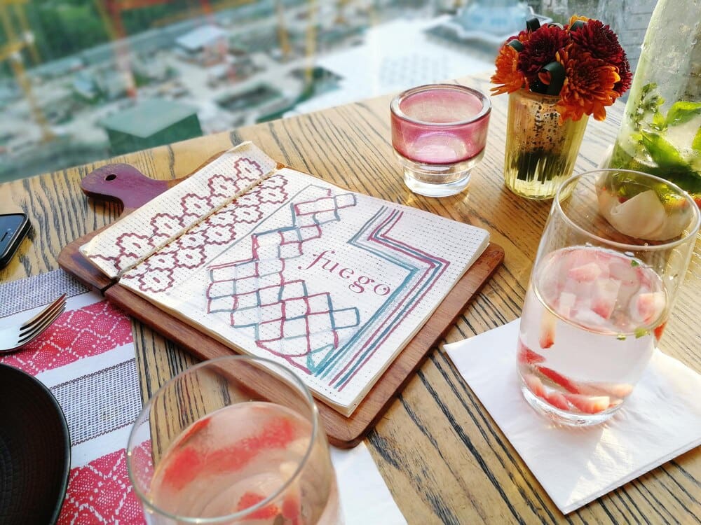 High-angle shot of a drink resting on a table.