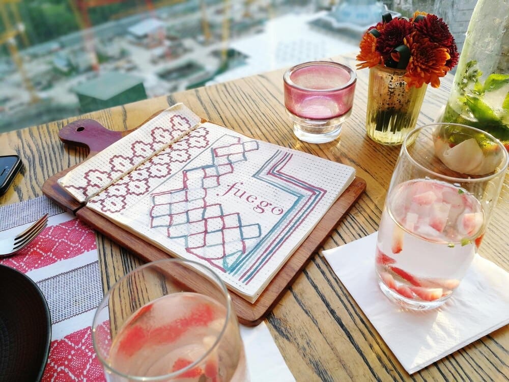 High-angle shot of a drink resting on a table.