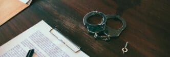 High-angle view of a pen resting on a table.