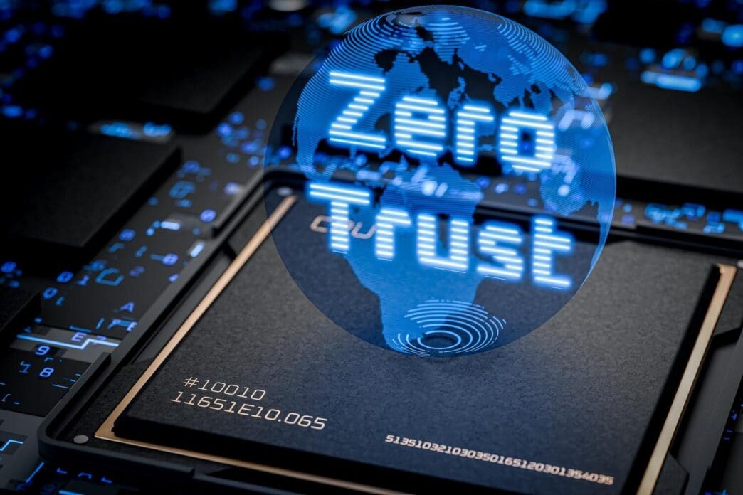 A 3D render depicts a microchip with the words "Zero Trust" and related security concepts overlaid.