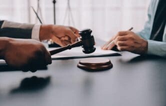 A lawyer explains legal documents to a client.
