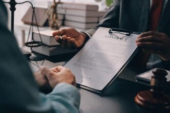 A lawyer explains legal proceedings to their client.