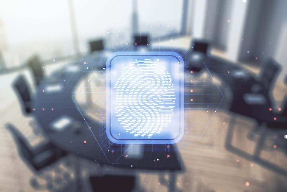 A digital fingerprint graphic overlays a modern classroom setting, illustrating a data security concept.