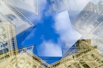 Multiple exposure photograph of a historic building layered against a bright sky.