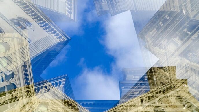 Multiple exposure photograph of a historic building layered against a bright sky.