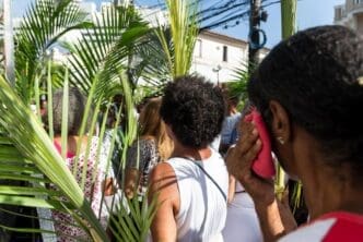 Catholics attend an outdoor Palm Sunday Mass in Salvador, Bahia, Brazil.