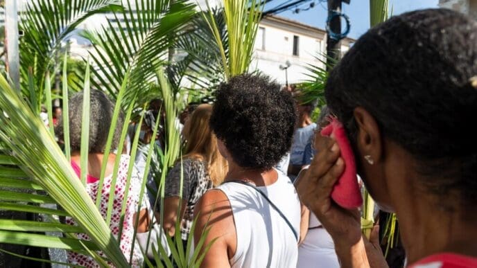 Catholics attend an outdoor Palm Sunday Mass in Salvador, Bahia, Brazil.