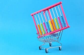 A shopping cart icon with an abacus inside sits on a light blue background.