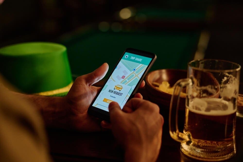 A smartphone displays a ride-sharing app interface.
