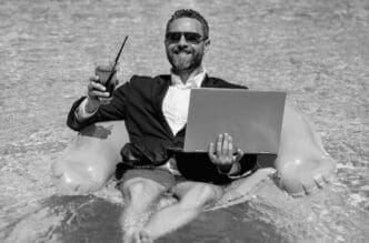 A person in formal wear is in a swimming pool.