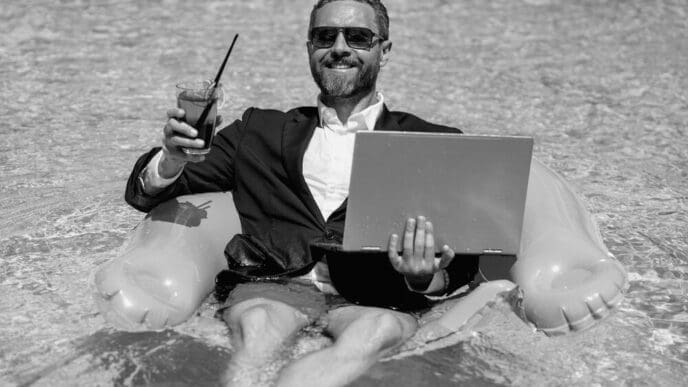A person in formal wear is in a swimming pool.
