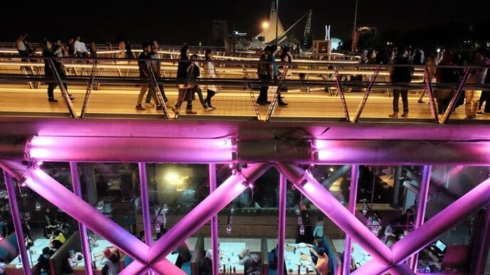 A modern pedestrian bridge, the Tabiat Bridge, spans a highway in Tehran, Iran, in 2016.