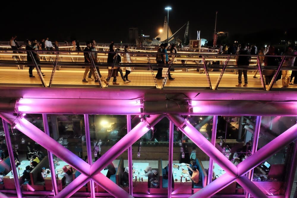 A modern pedestrian bridge, the Tabiat Bridge, spans a highway in Tehran, Iran, in 2016.