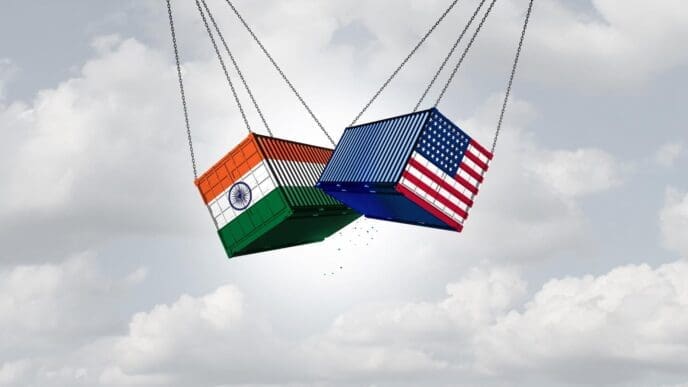A graphic depicts the USA and India engaged in a trade war, illustrating an economic conflict over tariffs and trade relationships.