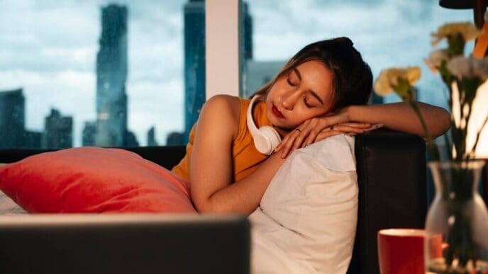 A woman is lying down on a table.