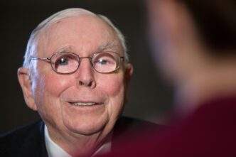 Charlie Munger, the vice chairman of Berkshire Hathaway, smiling during an interview