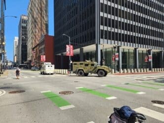 A Chicago Police Department Lenco armored vehicle blocks a downtown intersection during a lockdown