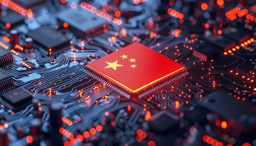 A red circuit board processor with the Chinese flag on it, surrounded by glowing lights