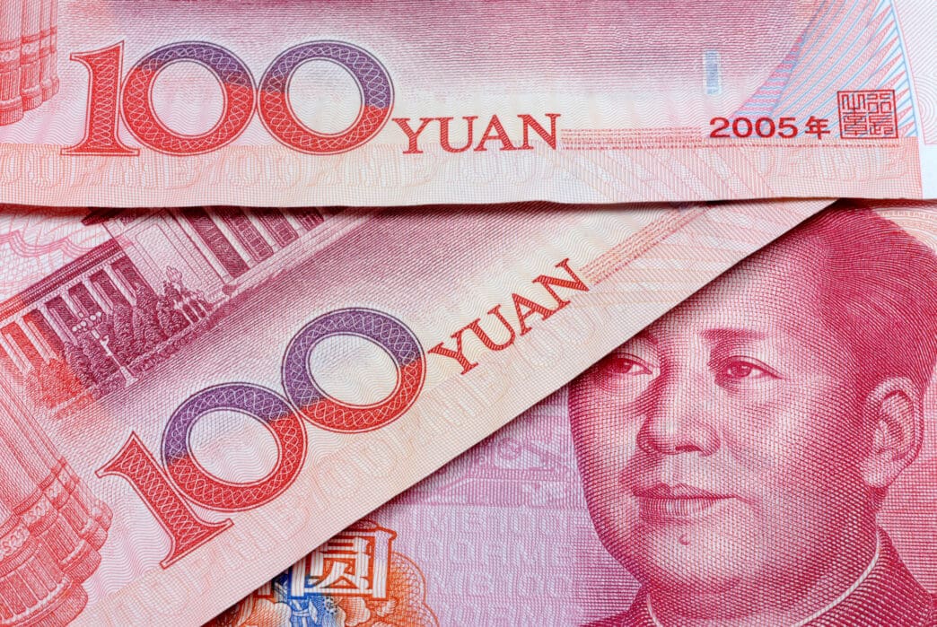 Close-up of 100 Yuan banknotes, showing Mao Zedong's portrait