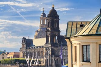The Dresden Frauenkirche and Higher Regional Court under a partly cloudy sky