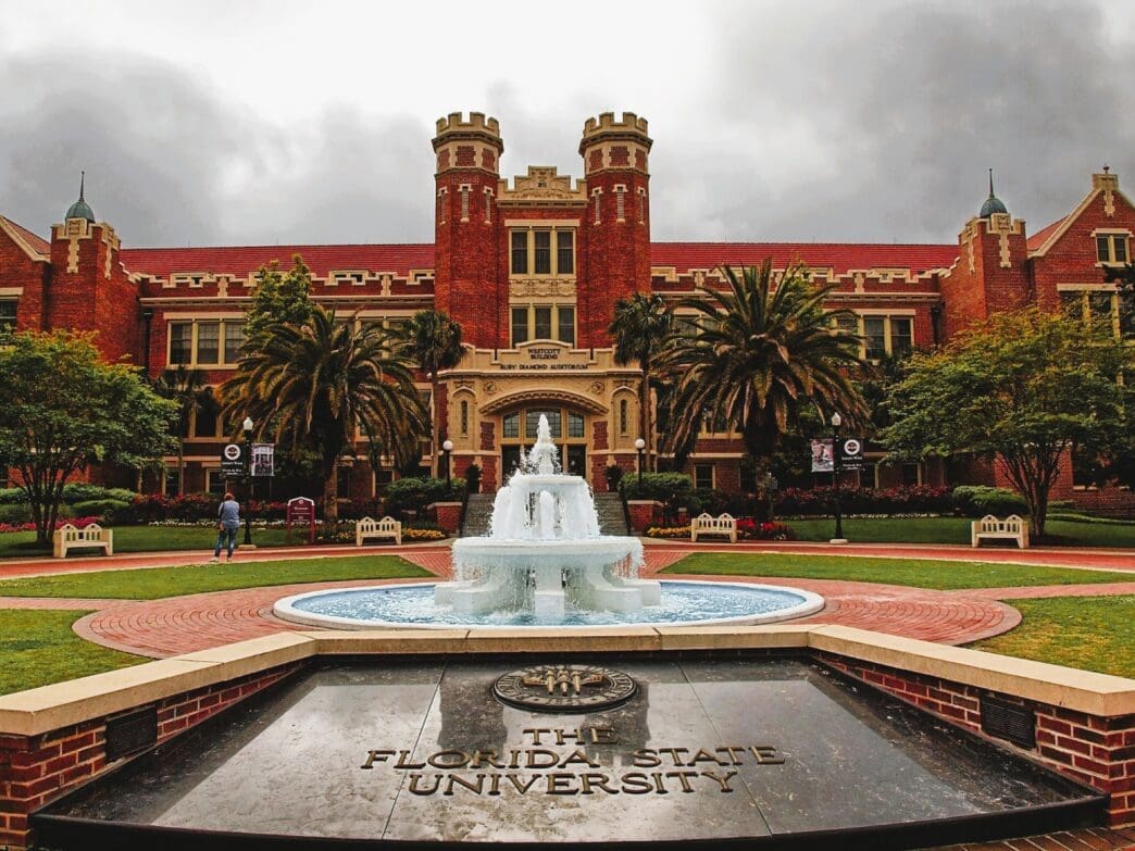 The fountain and courtyard in front of the historic red brick building of Florida State University's Ruby Diamond Auditorium