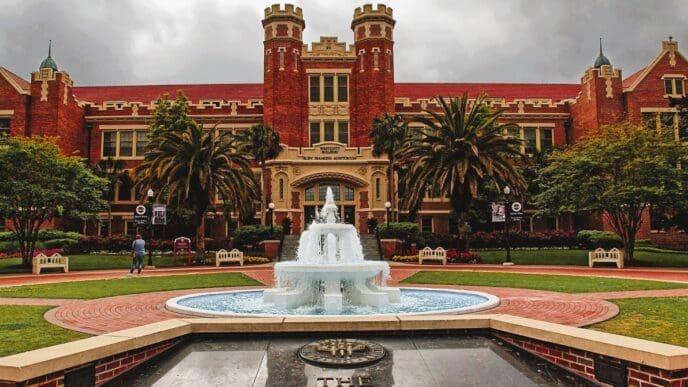 The fountain and courtyard in front of the historic red brick building of Florida State University's Ruby Diamond Auditorium
