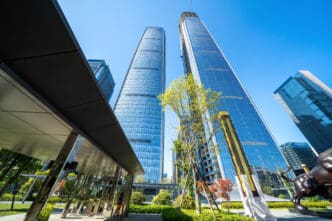 Modern skyscrapers and a bull sculpture in the business district of Guiyang, China