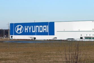 The exterior of a large Hyundai Motor Manufacturing plant building in Montgomery, Alabama