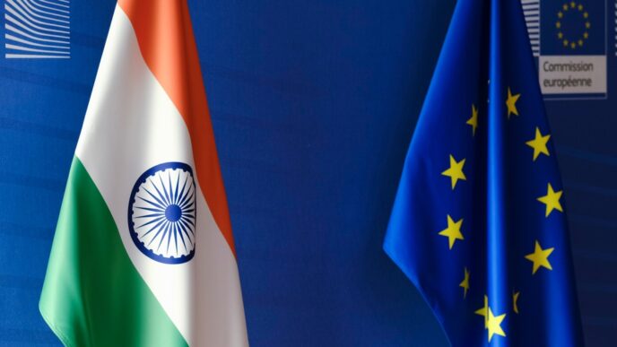 The flags of India and the European Union are displayed side-by-side