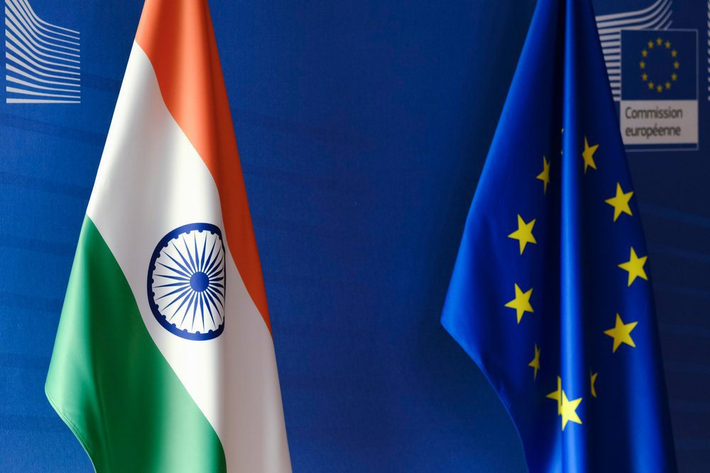 The flags of India and the European Union are displayed side-by-side