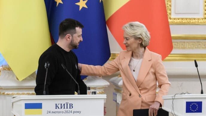 Zelenskiy and Von Der Leyen at press conference with flags