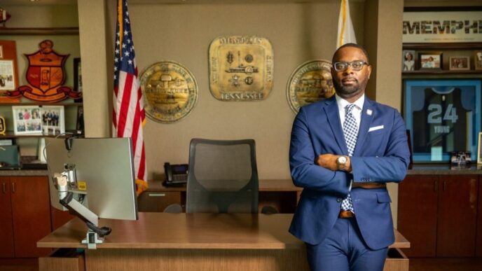 Memphis Mayor Paul Young stands with his arms crossed in his office in front of a desk