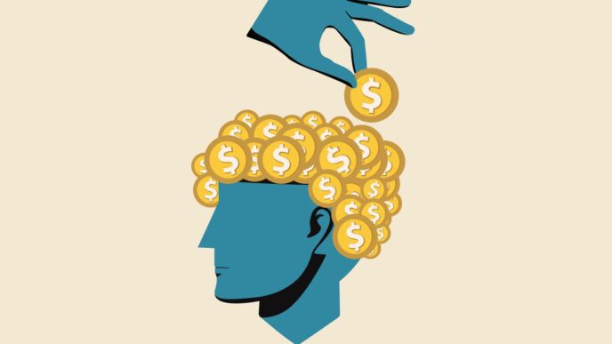 An illustration of a hand placing a golden coin into the head of a person