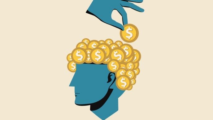 An illustration of a hand placing a golden coin into the head of a person