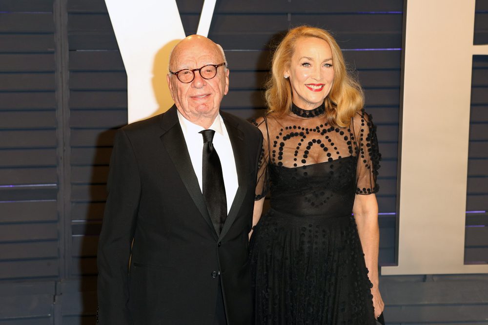 Rupert Murdoch and Jerry Hall pose together on the red carpet at a formal event