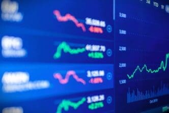 Stock market trading graph displayed on a blue screen