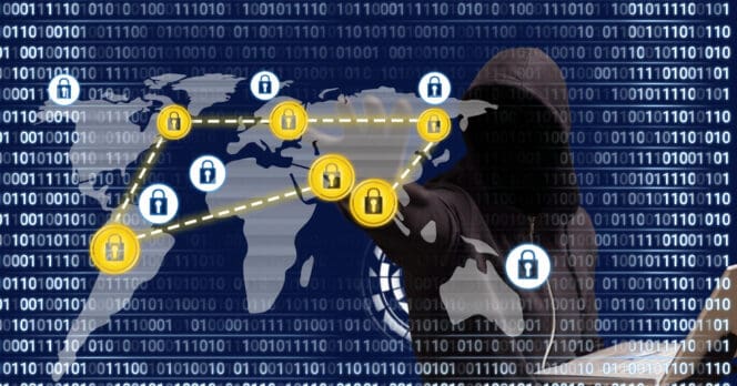 Hacker in a hoodie interacting with a digital map showing network connections and locks