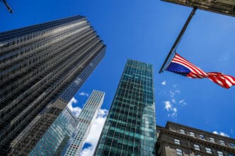 The Trump Tower and other skyscrapers in Manhattan, with an American flag flying