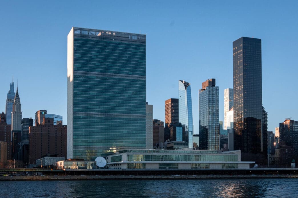United Nations Headquarters building and surrounding skyscrapers on the East River in New York City