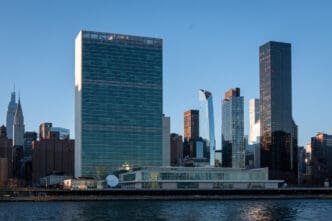 United Nations Headquarters building and surrounding skyscrapers on the East River in New York City