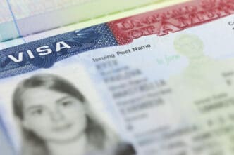 Close-up of a United States visa with a blurry photograph and personal information